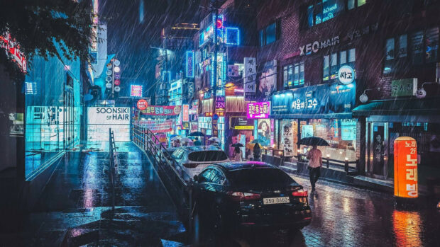 A rainy night in Korea city street with neon lights and people carrying umbrellas