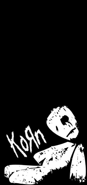 A black and white artistic drawing of a broken doll with the word Korn displayed prominently