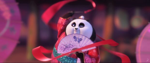 A Kung Fu Panda 3 character dressed in traditional attire holds a fan surrounded by red ribbons, 2K Desktop Wallpaper