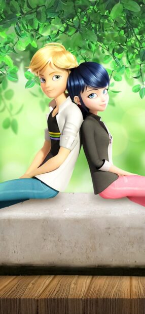 Ladybug and Cat Noir characters sitting back to back under green leaves