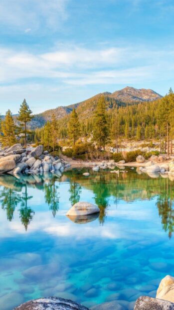 The clear water reflects pine trees and mountains at Lake Tahoe Emerald Bay, HD Mobile Wallpaper