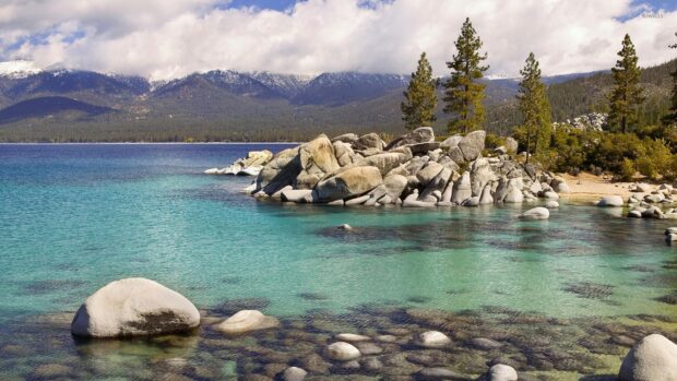 Lake Tahoe Emerald Bay shows crystal clear waters with rocky shores and pine trees, HD Desktop Wallpaper