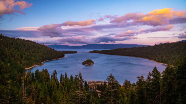 A panoramic view of Lake Tahoe's Emerald Bay surrounded by forested hills and a colorful sky, HD Desktop Wallpaper