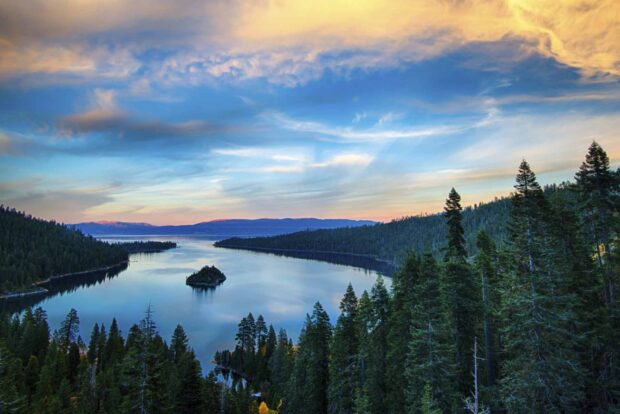 A peaceful view of Lake Tahoe Emerald Bay with trees and calm water, HD Desktop Wallpaper