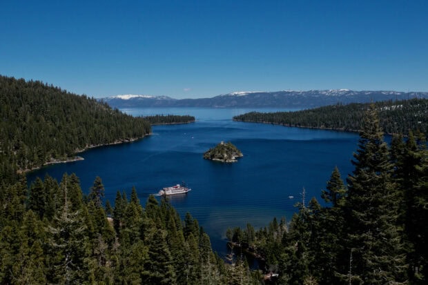 The serene view of Lake Tahoe Emerald Bay surrounded by forested mountains, HD Desktop Wallpaper