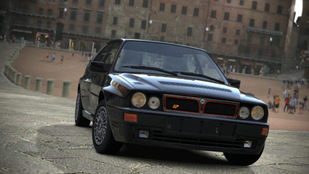 The Lancia wallpaper features a black HF Integrale parked on a cobblestone square with historic buildings in the background, 4K Desktop Wallpaper