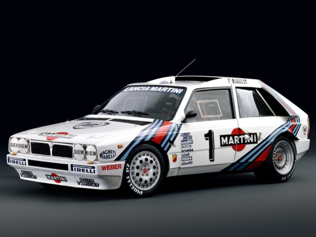 A white Lancia Martini racing car is displayed against a dark background, showing side and front views, HD Desktop Wallpaper