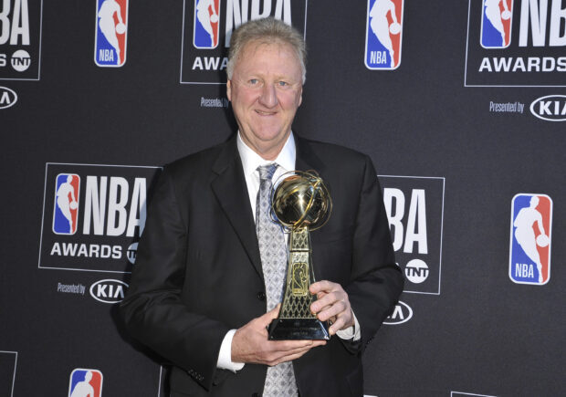 Larry Bird is holding an NBA trophy at the awards ceremony, 2K Desktop Wallpaper