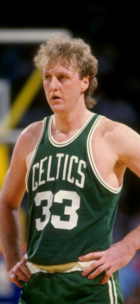 Larry Bird focused during a basketball game wearing the Celtics number 33 jersey, 2K Phone Wallpaper