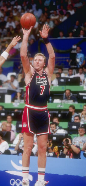 Larry Bird is taking a jump shot during a basketball game, 2K Mobile Wallpaper