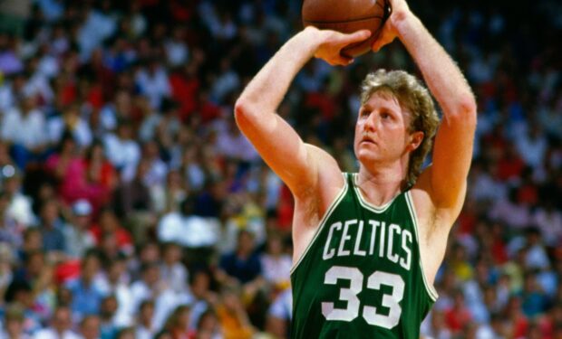 Larry Bird shooting a basketball during a game wearing Celtics jersey, HD Desktop Wallpaper