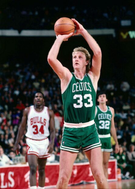 Larry Bird is preparing to shoot the ball during a game, HD Desktop Wallpaper