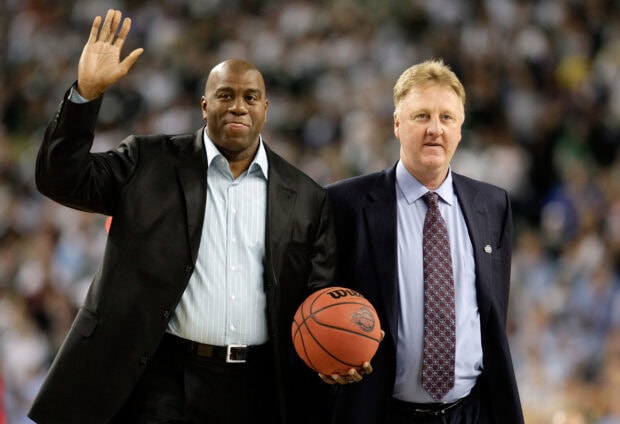 Larry Bird stands next to a basketball legend during an event, 2K Desktop Wallpaper