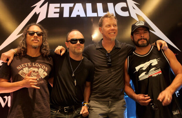 Lars Ulrich with Metallica band posing together at an event, 2K Desktop Wallpaper