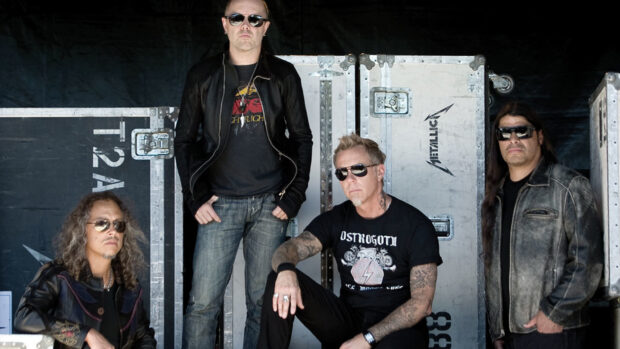 Lars Ulrich with his band posing against metal cases, HD Desktop Wallpaper