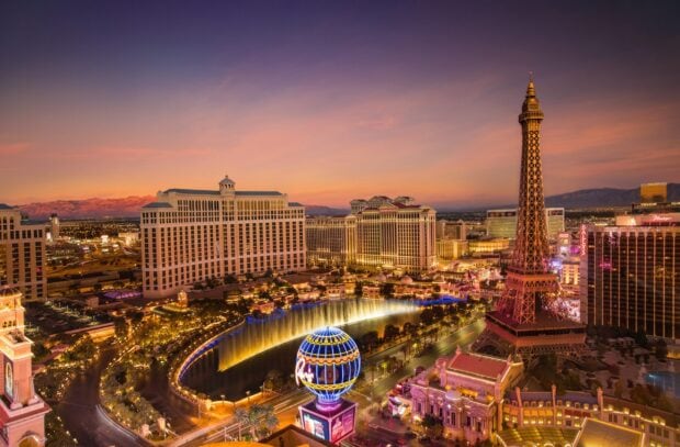 A stunning Las Vegas skyline view at sunset with iconic landmarks and vibrant city lights
