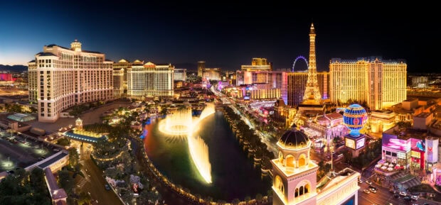 Las Vegas skyline view with Bellagio fountain and iconic buildings at night