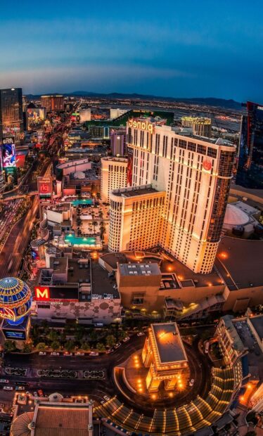 Evening view of Las Vegas skyline with glowing city lights and famous landmarks