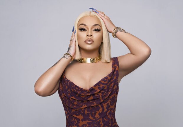 Latto Wallpapers features a confident woman with blonde hair and designer accessories, 2K Desktop Wallpaper