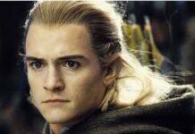 Close up of Legolas with focused eyes and blonde hair in an intense moment
