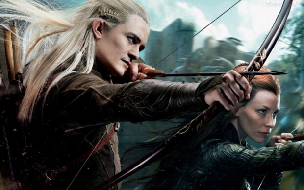Legolas aiming his bow with a companion in a battle scene