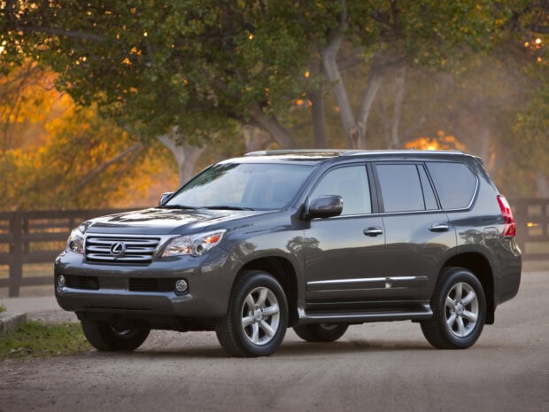 A gray Lexus GX is parked on a dirt road with autumn trees in the background, HD Desktop Wallpaper
