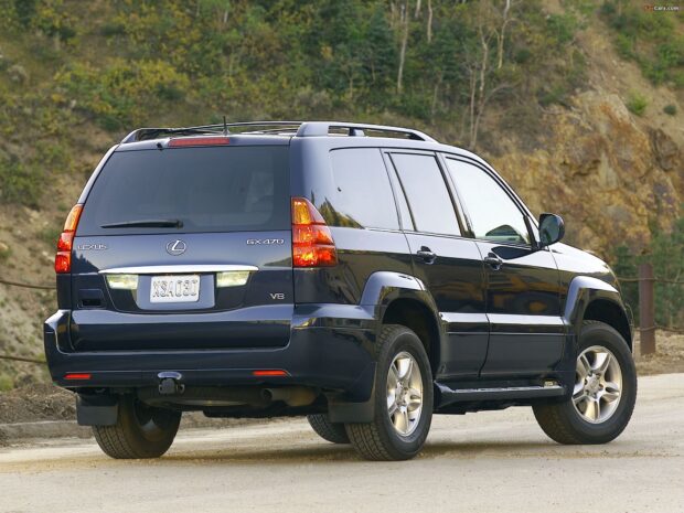 A blue Lexus GX470 parked in a mountainous area with clear details, HD Desktop Wallpaper