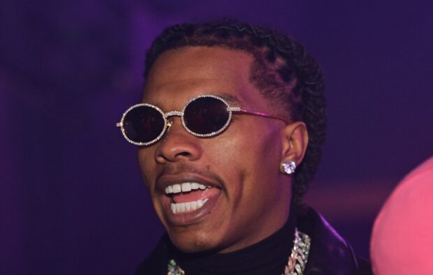 Lil Baby wears stylish sunglasses with a smile in a purple light, HD Desktop Wallpaper
