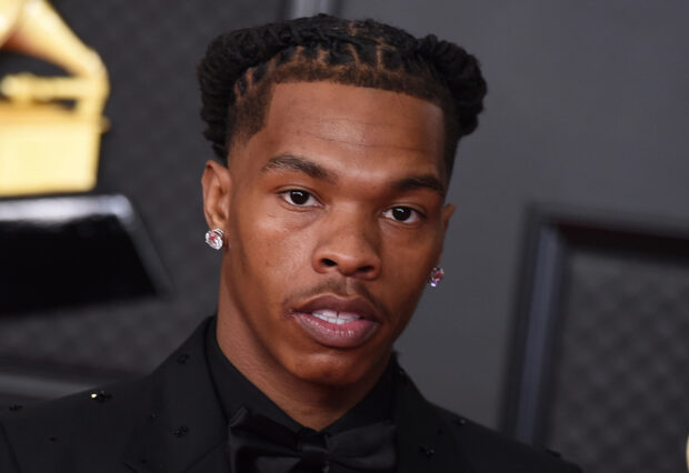 Lil Baby close up portrait with braided hair and earrings in a suit, HD Desktop Wallpaper
