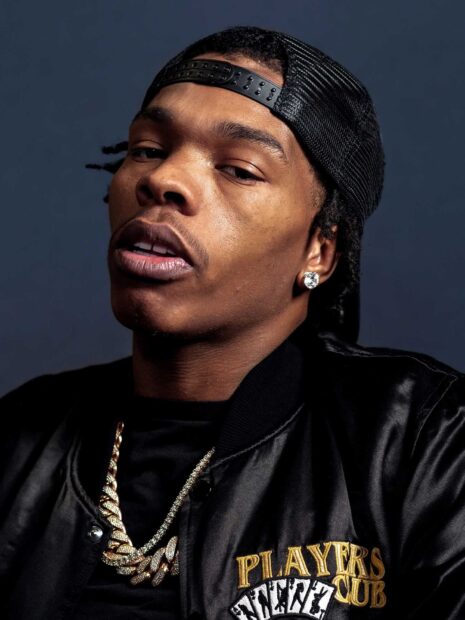 A close up portrait of Lil Baby wearing a black cap and gold chains, HD Phone Wallpaper