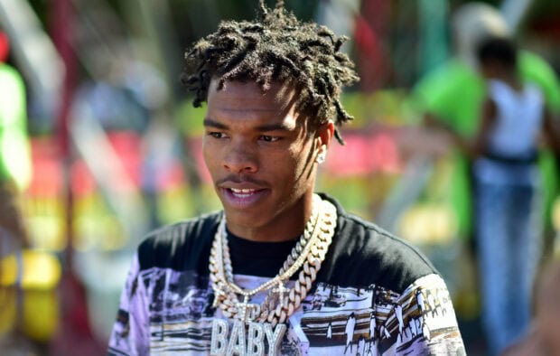 Lil Baby is wearing multiple chains and a patterned shirt in this close up, HD Desktop Wallpaper