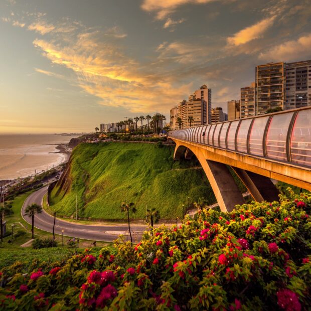 A scenic view of Lima Peru with a coastal park and sunset sky, HD Desktop Wallpaper