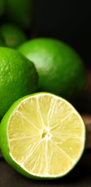 Close up of lime showing fresh juicy texture and green skin