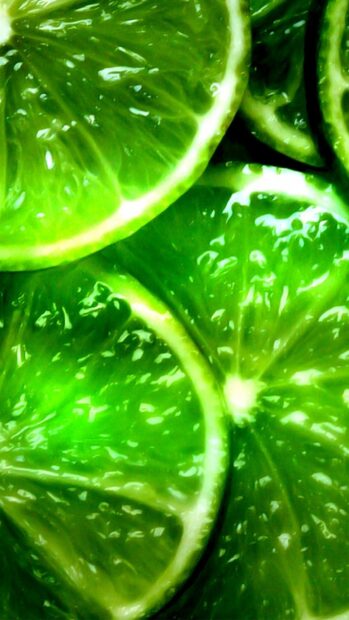 Close up of fresh lime slices with vibrant green texture