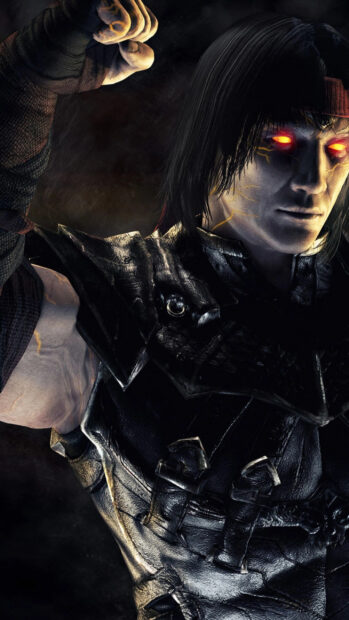 Dark Liu Kang character with glowing eyes in black armor raising his fist