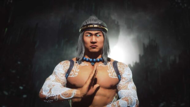 Liu Kang performing a martial arts pose with glowing eyes and dragon tattoos on his arms