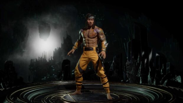 Liu Kang standing shirtless with yellow pants and tattoos in a dark mystical arena