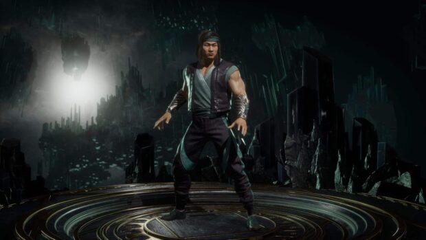 Liu Kang character stands ready in a dark futuristic arena with glowing structures