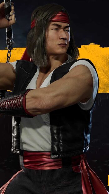 Liu Kang holding a staff wearing a red headband and black vest in a dynamic pose