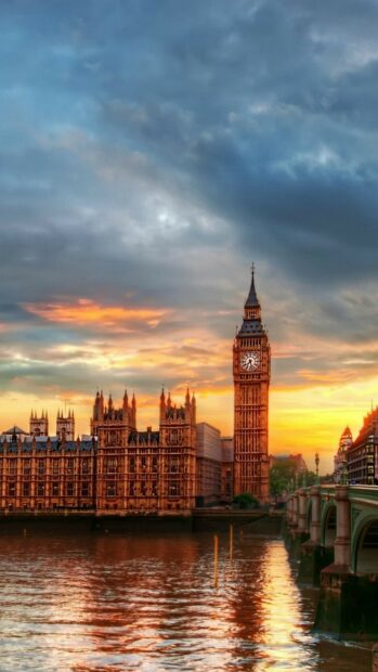 The United Kingdom Wallpapers show Big Ben tower illuminated by a colorful sunset sky over the river, HD Phone Wallpaper