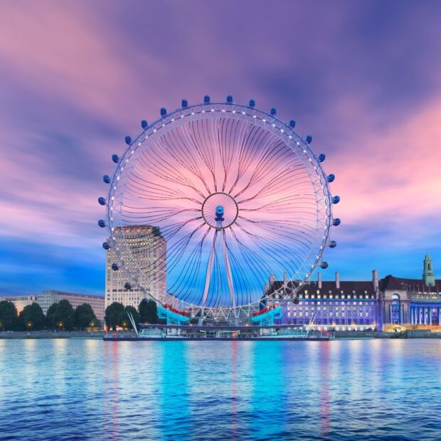 The London Eye stands tall against a colorful sunset sky reflecting on the river, HD Desktop Wallpaper
