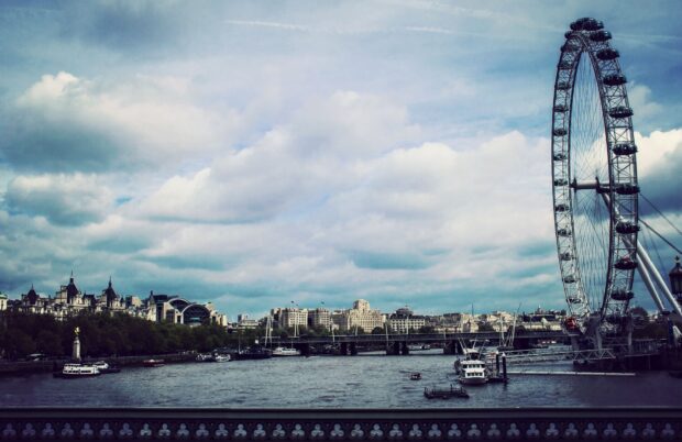 A large Ferris wheel near the River Thames stands tall with the London city skyline, HD Wallpaper