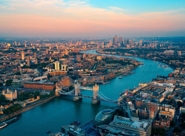 The London skyline shows the River Thames and historic buildings under a colorful sky, HD Desktop Wallpaper