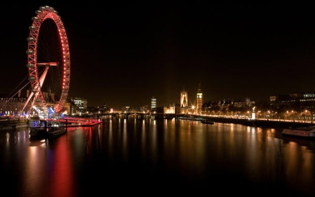 The London skyline features the London Eye and Big Ben glowing at night, HD Desktop Wallpaper
