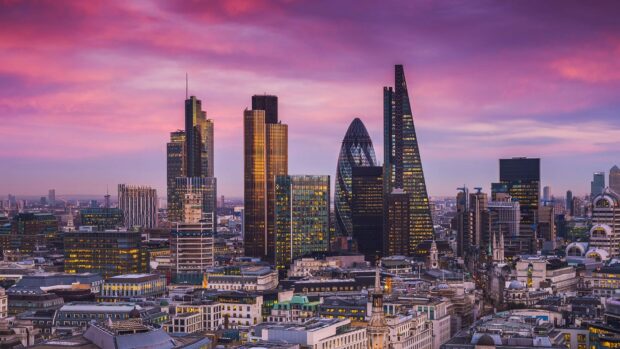The London skyline features modern and historic buildings under a purple sunset sky, HD Desktop Wallpaper