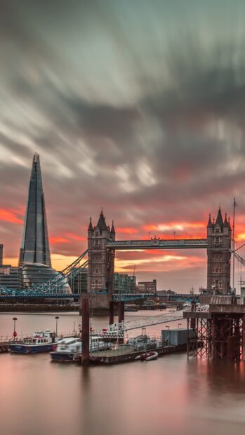 The London skyline features Tower Bridge and The Shard against a colorful sunset sky, 4K Phone Wallpaper