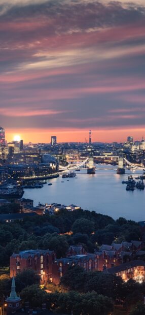 The London skyline shows iconic landmarks under a colorful sky at sunset, HD Mobile Wallpaper