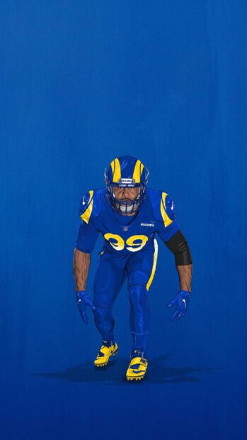A Los Angeles Rams player is ready to make a move on the field in full uniform, HD Phone Wallpaper