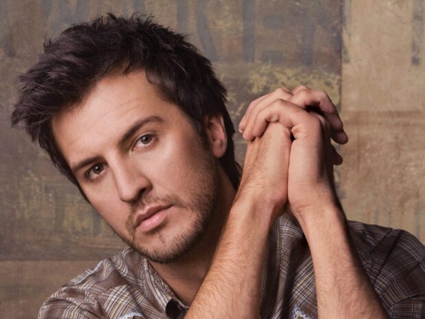 A close up portrait of Luke Bryan with his hands clasped, HD Desktop Wallpaper