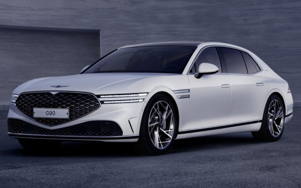 A white Genesis G90 luxury car is parked in front of a minimalistic gray wall, HD Desktop Wallpaper